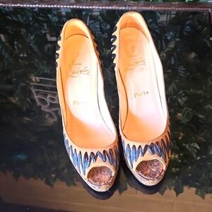 Preowned Christian Louboutin yoyo zeppa raffia.brown heels. Sz 38 1/2